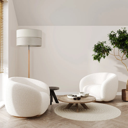 ECO floor lamp styled in a living room corner beside a sofa
