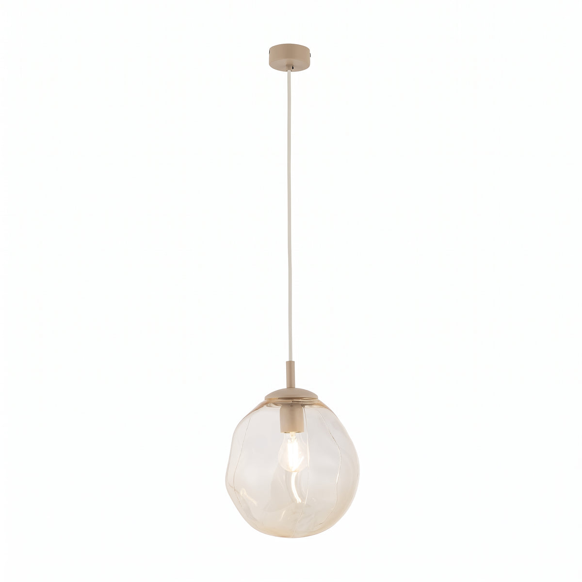 LAVA Medium pendant lit, clear filament bulb visible through the amber glass