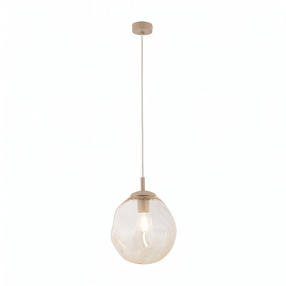LAVA Medium pendant lit, clear filament bulb visible through the amber glass