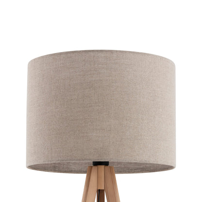 Close view of the solid pine leg and natural linen shade on the GRAND floor lamp
