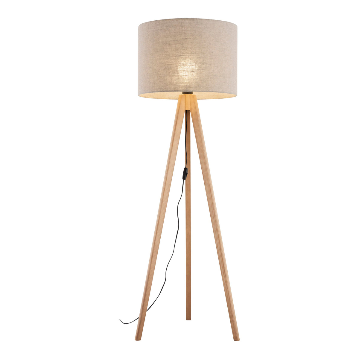 GRAND floor lamp lit, warm light diffused through the natural linen shade