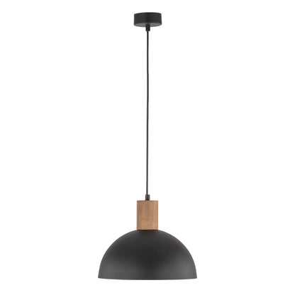 OSLO black pendant lit above a counter in the evening