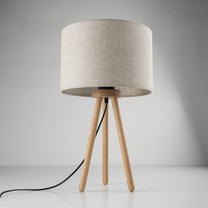TOKYO natural linen table lamp beside a bed