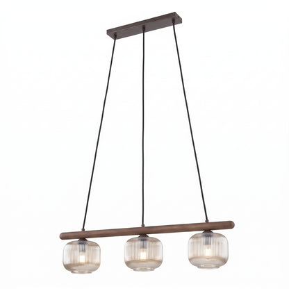 SALVIA linear pendant hung over a dining table